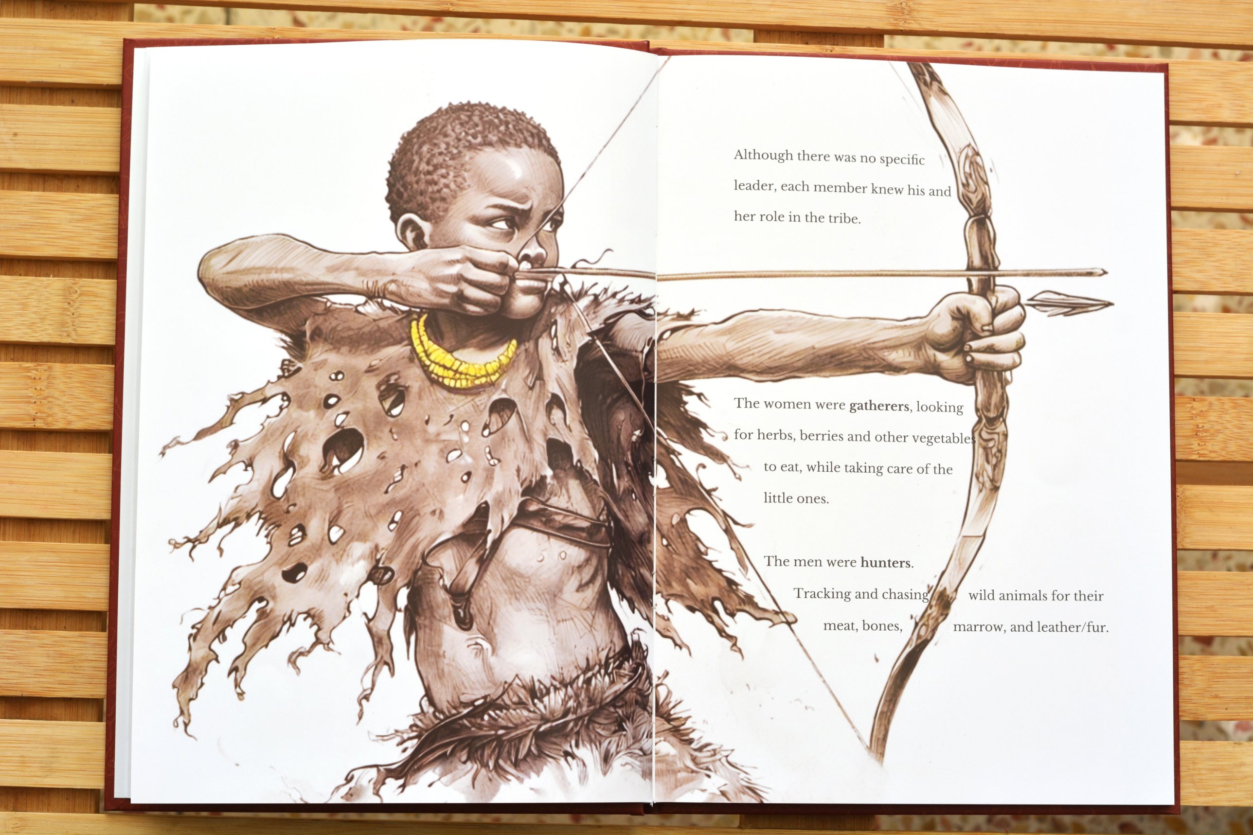 Young hunter with a bow and arrow