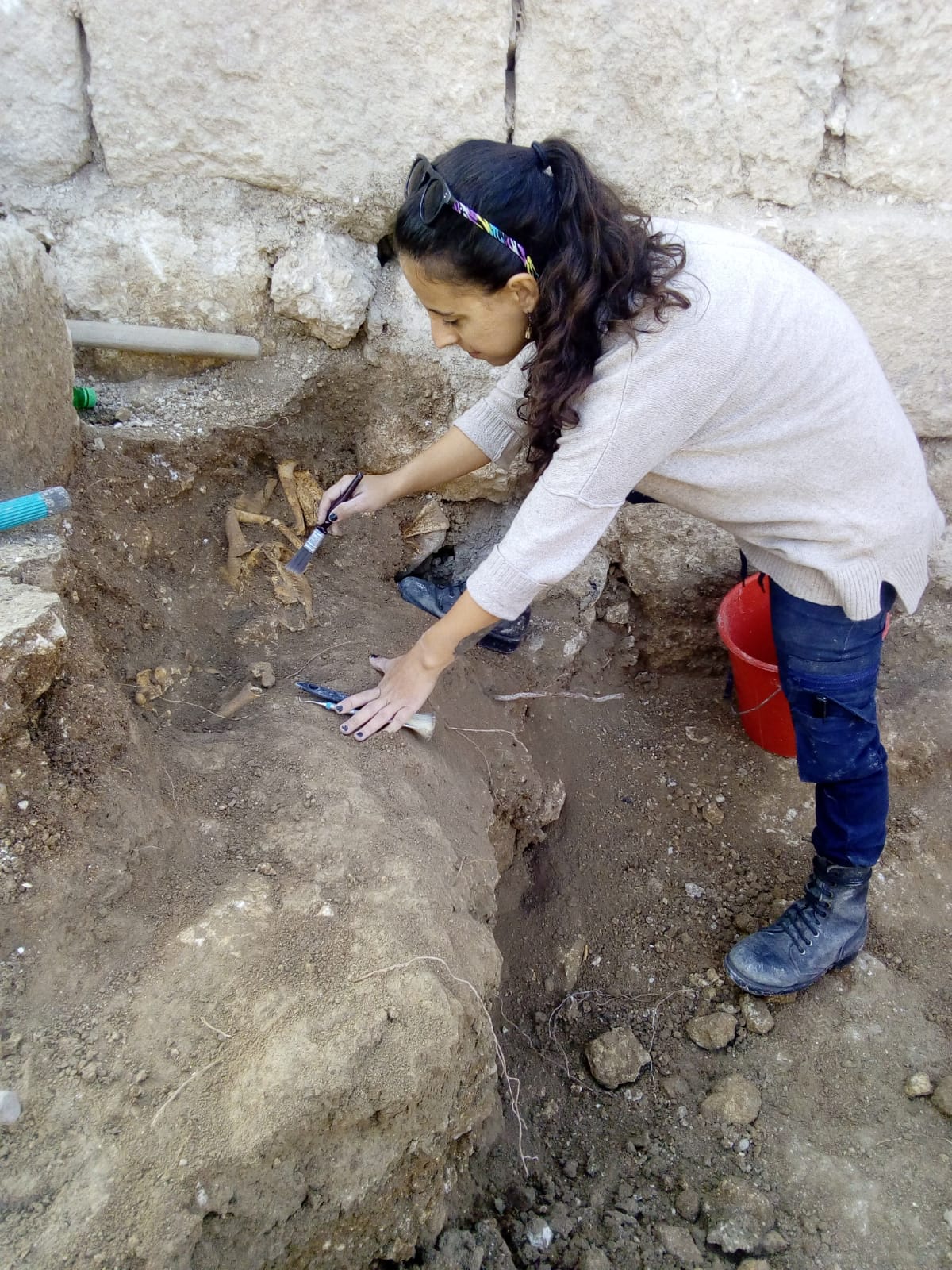 Dr. Namdar excavating ancient remains